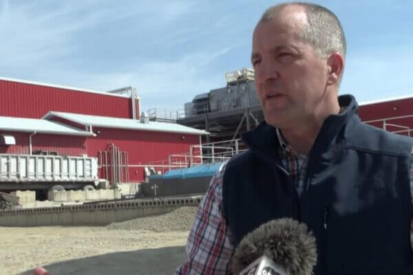 Mike Naig, Iowa Ag Secretary, standing in front of Upper Iowa Beef
