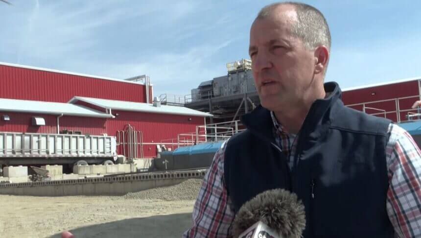 Mike Naig, Iowa Ag Secretary, standing in front of Upper Iowa Beef