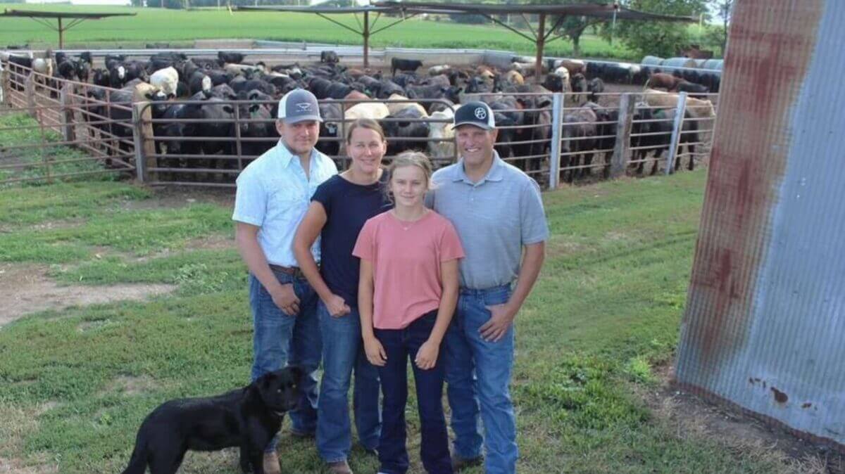 Knobloch Family standing in front of their herd