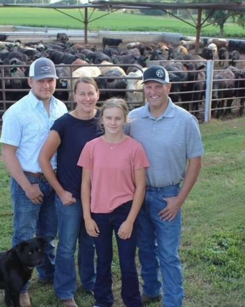 Knobloch Family standing in front of their herd