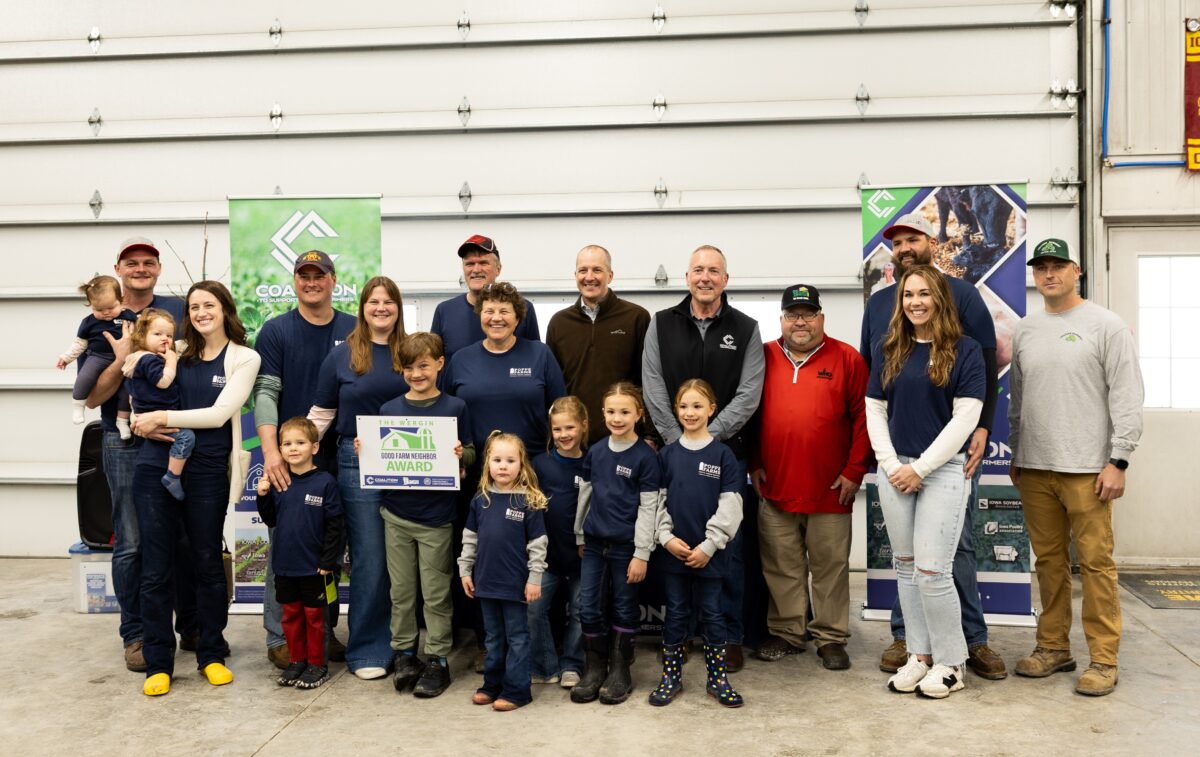 Poppe Farms family, Coalition to Support Iowa's Farmers The Good Neighbor Award, family photo in shed on family farm.